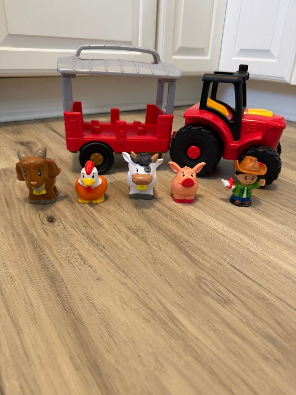 Little People Caring for Animals Tractor Set with Trailer 4 Animals & Farmer Fig